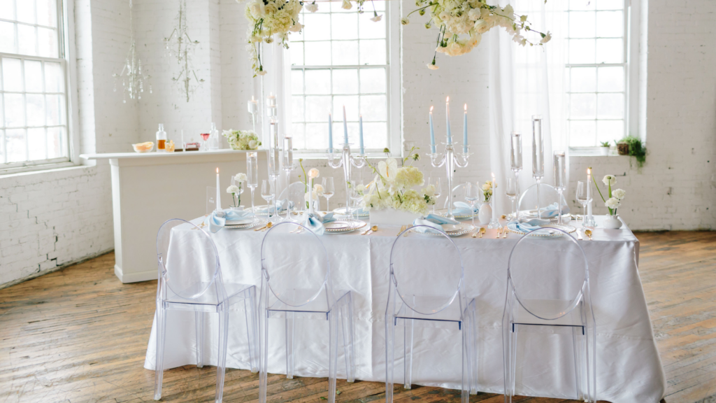 A white themed wedding and wedding table